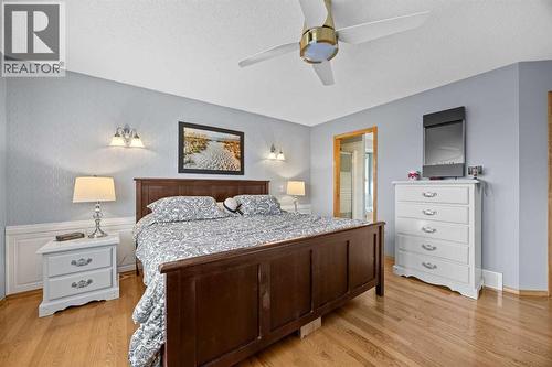 244 Oakmere Place, Chestermere, AB - Indoor Photo Showing Bedroom