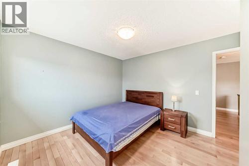668 Scimitar Bay Nw, Calgary, AB - Indoor Photo Showing Bedroom