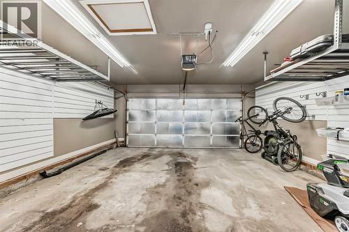668 Scimitar Bay Nw, Calgary, AB - Indoor Photo Showing Garage