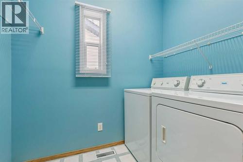 276 Hidden Valley Grove Nw, Calgary, AB - Indoor Photo Showing Laundry Room