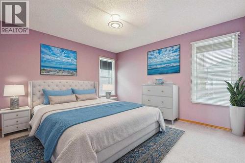 276 Hidden Valley Grove Nw, Calgary, AB - Indoor Photo Showing Bedroom