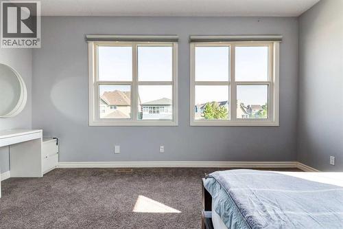 14 Marquis Heights Se, Calgary, AB - Indoor Photo Showing Bedroom