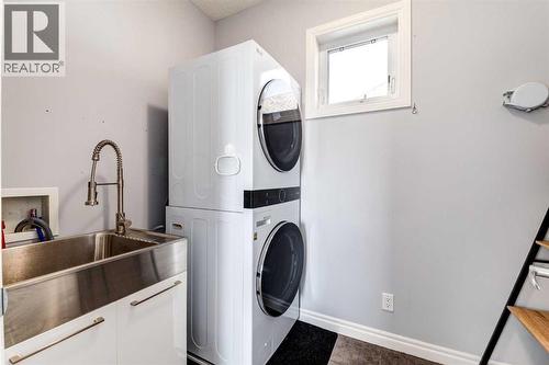 2nd floor Laundry Room - 14 Marquis Heights Se, Calgary, AB - Indoor Photo Showing Laundry Room