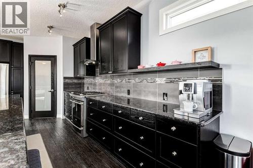 14 Marquis Heights Se, Calgary, AB - Indoor Photo Showing Other Room