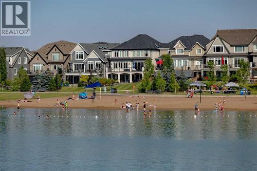 14 Marquis Heights Se, Calgary, AB - Outdoor With Body Of Water With Facade