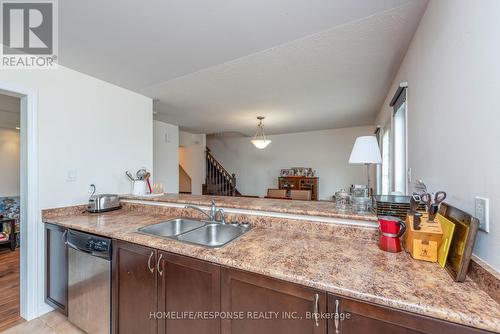 577 Pharo Point, Milton, ON - Indoor Photo Showing Kitchen With Double Sink
