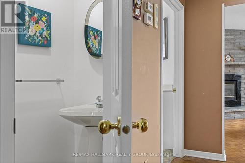 Main floor powder room  door - 944 Greenbriar Avenue, Ottawa, ON - Indoor Photo Showing Bathroom