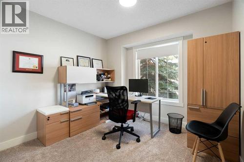 Bedroom #2 - 111 Woodside Circle Nw, Airdrie, AB - Indoor Photo Showing Office