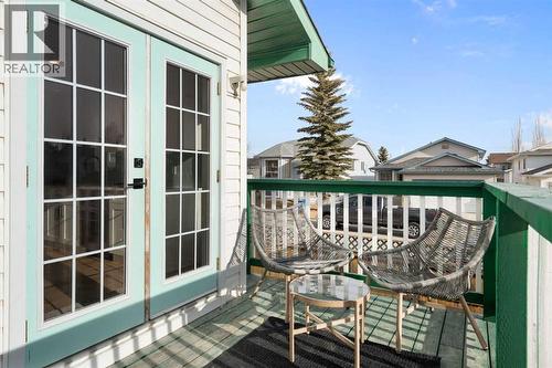 Deck off kitchen - 111 Woodside Circle Nw, Airdrie, AB - Outdoor With Deck Patio Veranda With Exterior