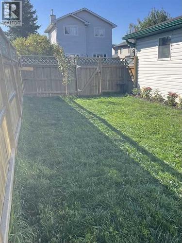 Backyard - 111 Woodside Circle Nw, Airdrie, AB - Outdoor