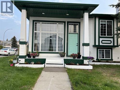 Front Exterior - 111 Woodside Circle Nw, Airdrie, AB - Outdoor With Facade