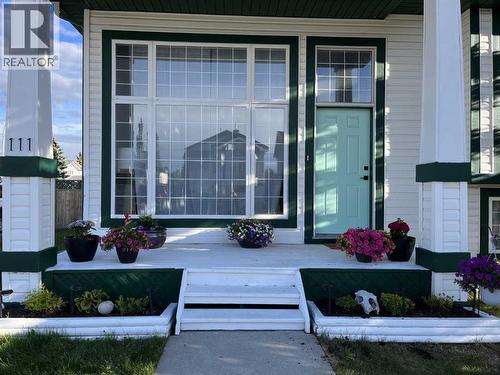 Front Exterior - 111 Woodside Circle Nw, Airdrie, AB - Outdoor