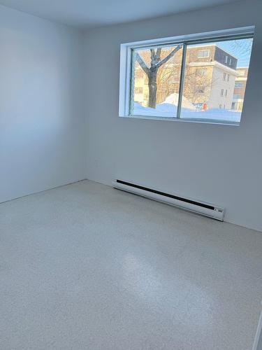 Chambre à coucher - 2-845 Rue Rouleau, Saint-Hyacinthe, QC - Indoor Photo Showing Other Room