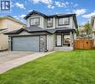 Extra long driveway and street parking - 11931 Valley Ridge Drive Nw, Calgary, AB  - Outdoor 