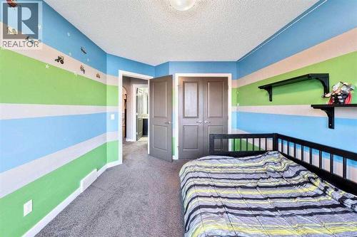 285 Evanspark Gardens Nw, Calgary, AB - Indoor Photo Showing Bedroom