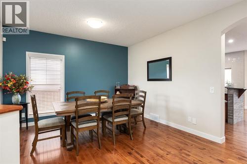 Hardwood floors - 128 Seagreen Manor, Chestermere, AB - Indoor Photo Showing Dining Room
