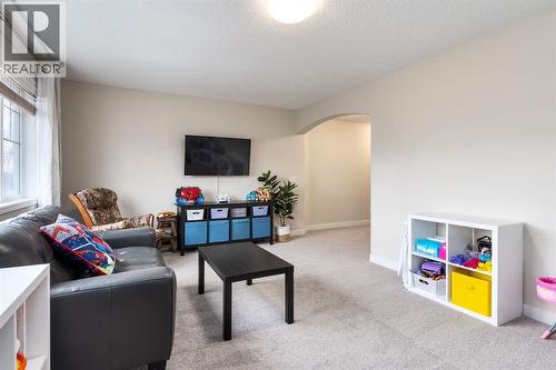 128 Seagreen Manor, Chestermere, AB - Indoor Photo Showing Living Room