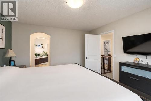 128 Seagreen Manor, Chestermere, AB - Indoor Photo Showing Bedroom