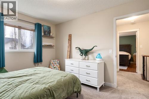 128 Seagreen Manor, Chestermere, AB - Indoor Photo Showing Bedroom