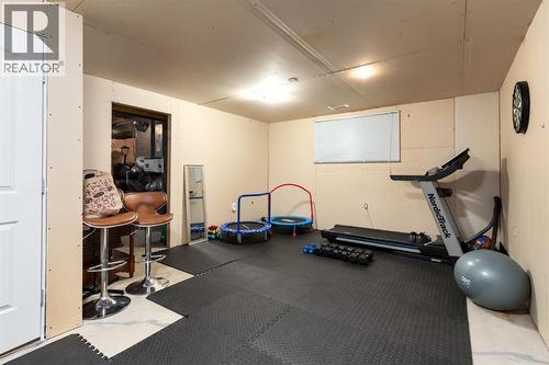 Basement is partially finished - 128 Seagreen Manor, Chestermere, AB - Indoor Photo Showing Gym Room