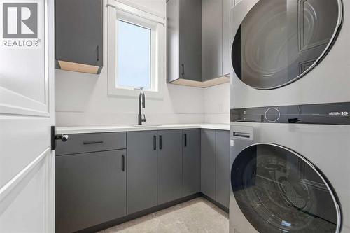 134 Lissington Drive Sw, Calgary, AB - Indoor Photo Showing Laundry Room
