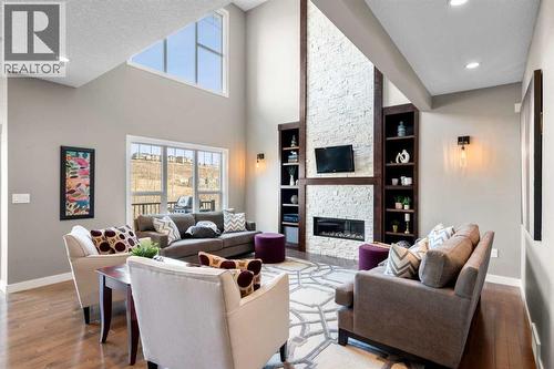 173 Sage Meadows Circle Nw, Calgary, AB - Indoor Photo Showing Living Room With Fireplace