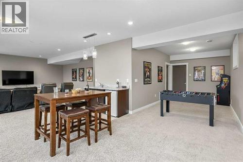 Virtually Staged Basement Rec Room - 173 Sage Meadows Circle Nw, Calgary, AB - Indoor