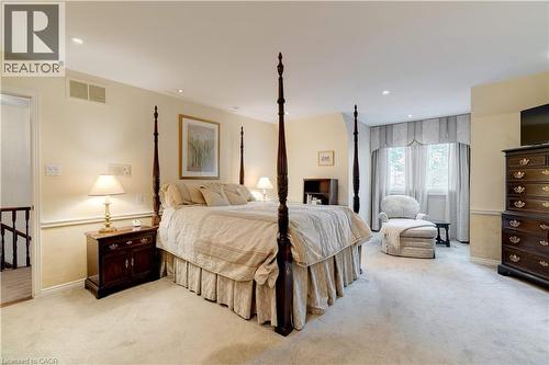 Bedroom featuring light colored carpet and recessed lighting - 166 Maple Grove Drive, Oakville, ON - Indoor Photo Showing Bedroom