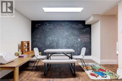 Dining space with wood finished floors and baseboards - 166 Maple Grove Drive, Oakville, ON - Indoor