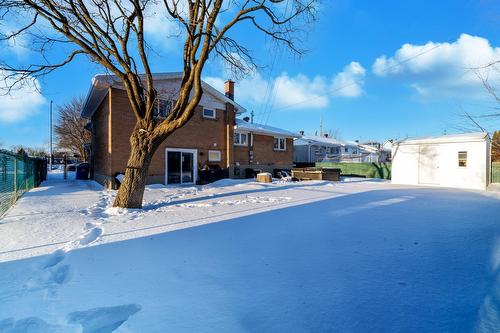 Back facade - 90 Rue Roger-Pilon, Dollard-Des-Ormeaux, QC - Outdoor