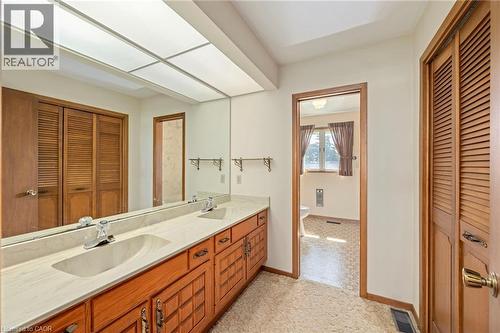 Bathroom featuring a closet and double vanity - 6828 Third Line, Chatham, ON 