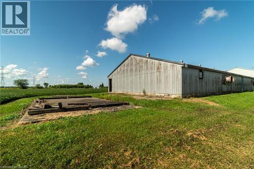 View of pole building with a lawn, a view of rural / pastoral area, and agricultural plots - 6828 Third Line, Chatham, ON - Outdoor