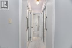 Primary Bedroom His and Her's Closets and Bathroom beyond - 