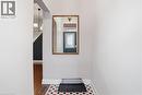 Hallway with baseboards and wood finished floors - 313 Mary Street, Hamilton, ON  - Indoor Photo Showing Other Room 
