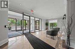 Common area featuring crown molding and recessed lighting - 