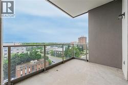 Balcony featuring a view of city - 