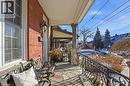 Large sunlit porch for morning coffee or catching up with a friend! - 81 Simcoe Street E, Hamilton, ON  - Outdoor With Exterior 