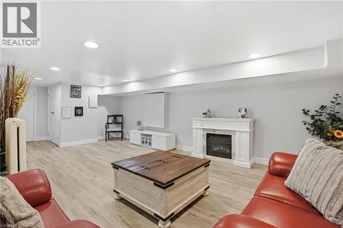 81 Simcoe Street E, Hamilton, ON - Indoor Photo Showing Living Room With Fireplace