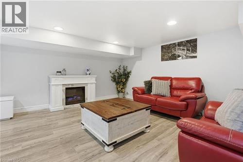 81 Simcoe Street E, Hamilton, ON - Indoor Photo Showing Living Room With Fireplace
