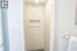 Bathroom with a stall shower - 