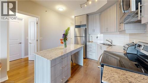 560 North Service Road Unit# 304, Grimsby, ON - Indoor Photo Showing Kitchen With Stainless Steel Kitchen With Double Sink With Upgraded Kitchen