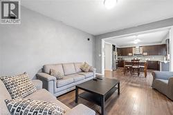 Living area with dark wood finished floors - 