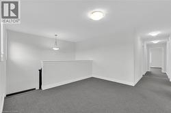 Unfurnished room featuring carpet floors - 
