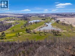Aerial overview of property's location featuring a large body of water - 