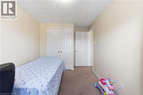 185 Denistoun Street Unit# 116, Welland, ON - Indoor Photo Showing Bedroom
