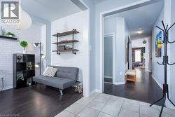 Corridor with baseboards and light wood-type flooring - 