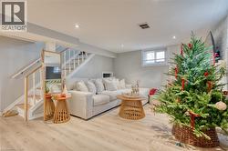 Living room with light hardwood / wood-style flooring - 