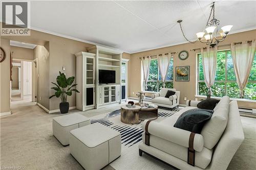 virtually staged - 249 Major Mackenzie Drive E Unit# 106, Richmond Hill, ON - Indoor Photo Showing Living Room