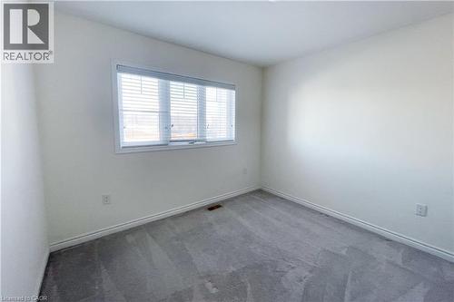 Carpeted empty room featuring baseboards - 116 Watermill Street, Kitchener, ON - Indoor Photo Showing Other Room