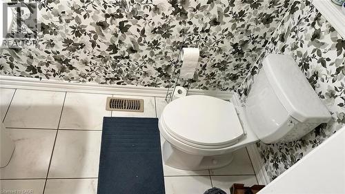 Bathroom view of wallpapered walls - 128 Watermill Street, Kitchener, ON - Indoor Photo Showing Bathroom